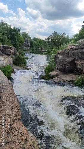 a river in the middle of a beautiful canyon