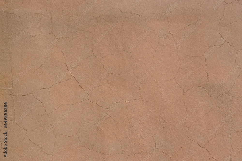 Fototapeta premium Plastered wall surface with cracks