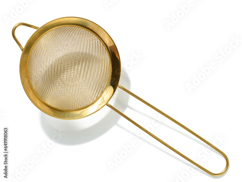 Golden strainer for bulk products on a white isolated background, top view
