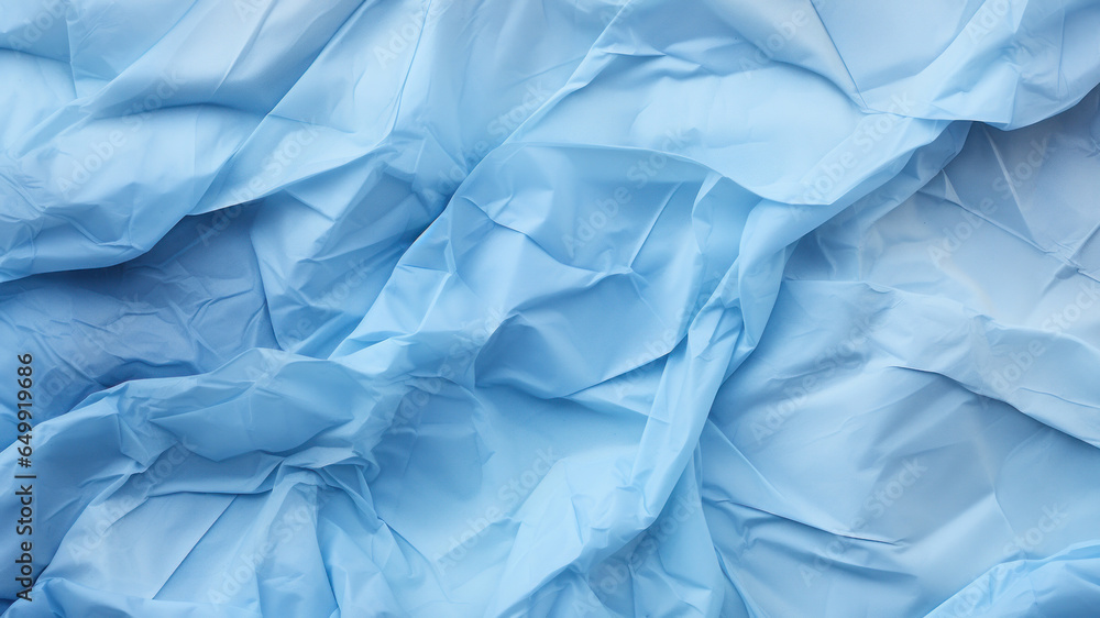 Fototapeta premium Light blue crumpled paper texture background