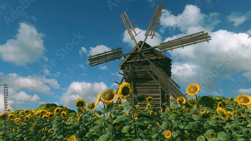 An old wooden mill among a field with sunflowers against a background of blue sky with clouds. Peaceful rural landscape. Photorealistic 3D illustration.