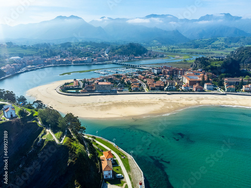 Aerial panoramic view, vacation on Costa Verde, Green coast of Asturias, Ribadesella village with sandy beaches, North of Spain photo