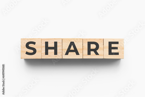 Share wooden cubes on white background