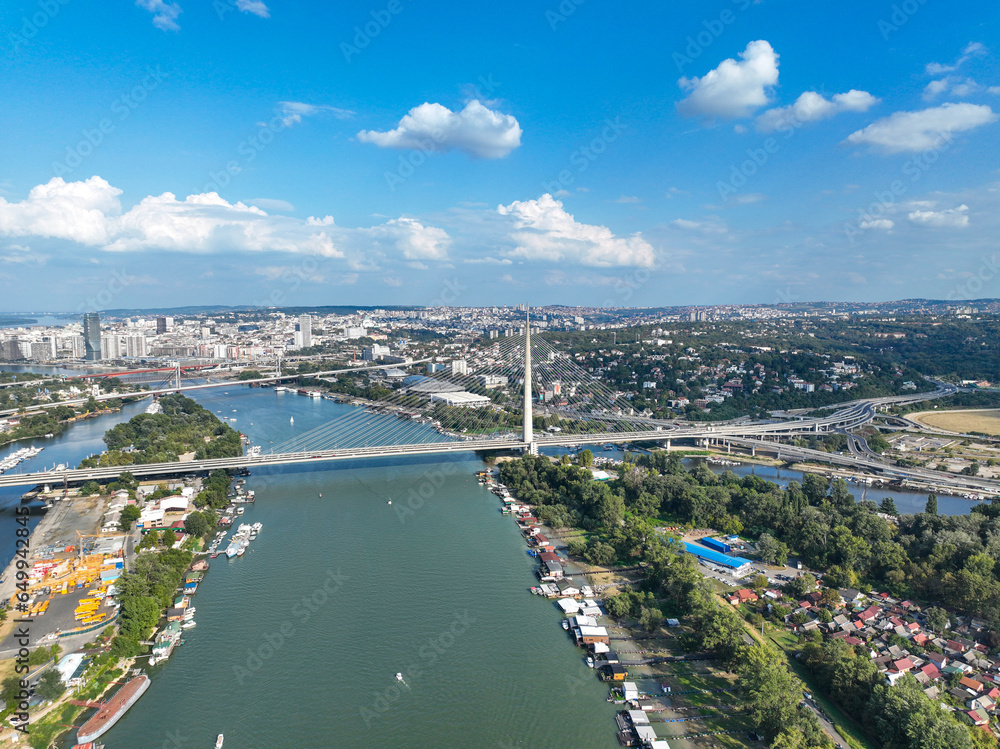 View of Ada Ciganlija from aerial drone and Most na Adi bridge over Sava River. Belgrade - Serbia View of Ada Ciganlija from aerial drone and Most na Adi bridge over Sava River. Belgrade - Serbia
