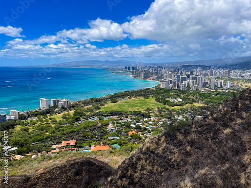 Hiking the Diamond Head Volcano Trail in Honolulu, Hawaii, looking  down at Waikiki, Hawaii from the Fire Control Station used in World War 2 photo