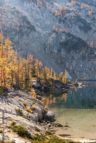 Golden larches on barren granite in Enchantment Lakes Wilderness in Washington