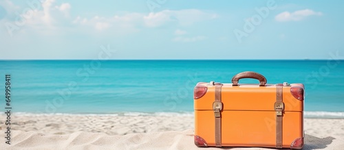 Tropical beach concept vintage suitcase with summer accessories copy space