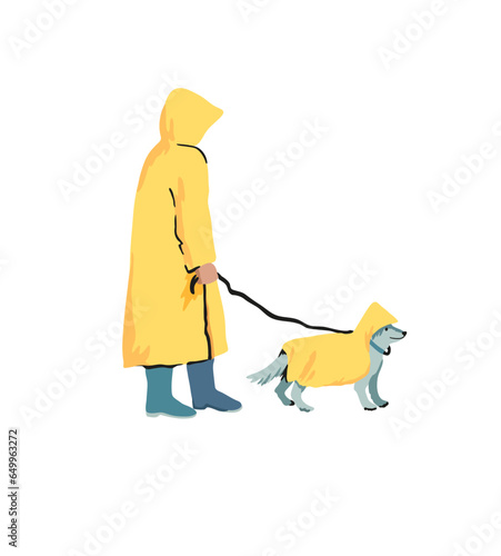People walk dog in bad weather in yellow raincoat.