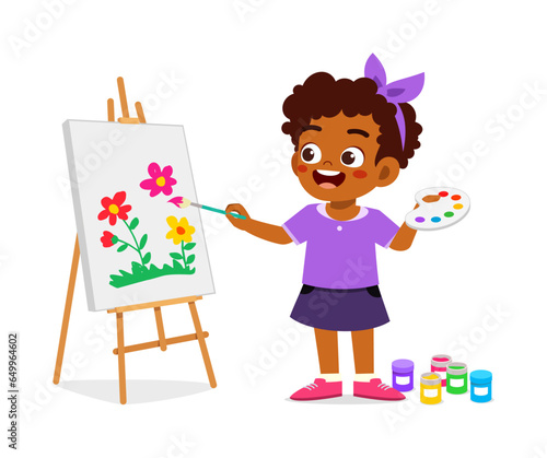 little kid drawing with paint on canvas