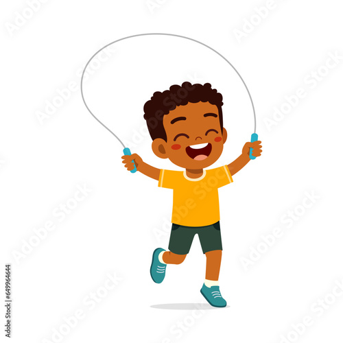 little kid play jumping rope and feel happy