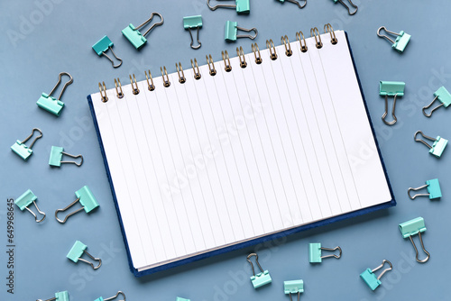 Open spiral notebook with l...