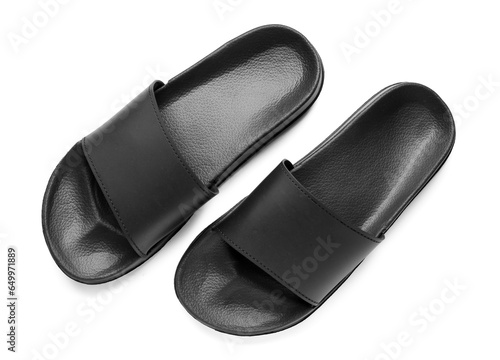 Black female flip flops on white background