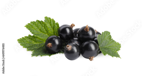 Ripe blackcurrants and leaves isolated on white
