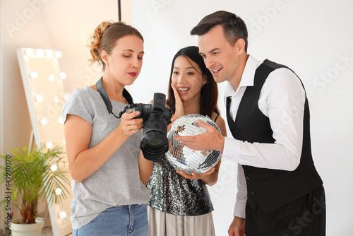 Female photographer working...