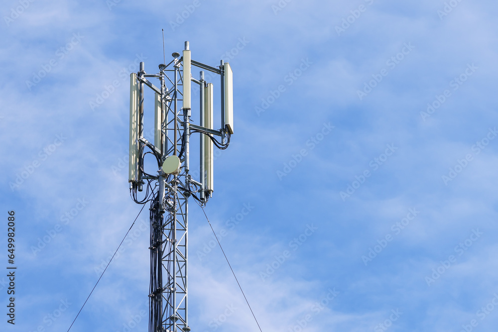 Telecommunication tower with blue sky background. Technology and communication Telecommunication tower with blue sky background. Technology and communication