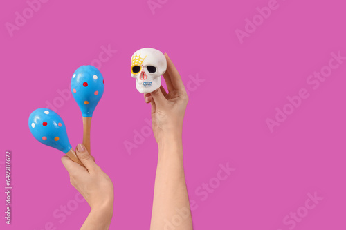 Female hands holding painte...