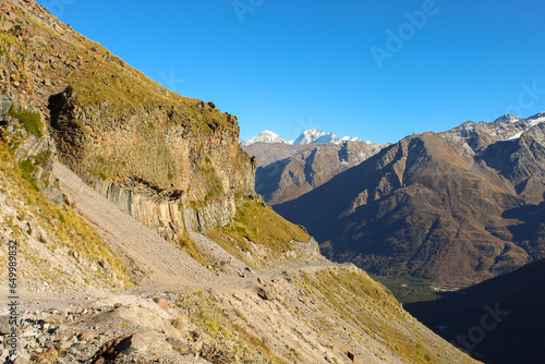 The path through granite rocks aroung Mount Elbrus Region, Russia photo