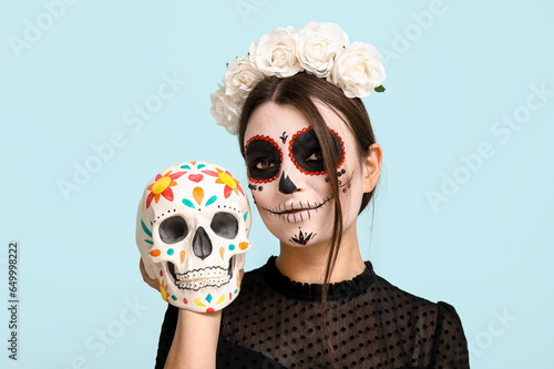 Young woman dressed for Hal...