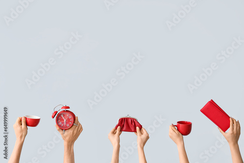 Hands holding alarm clock, ...