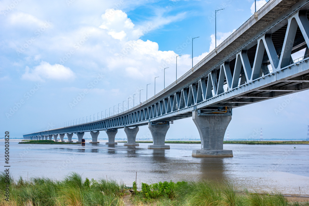 View of Padma Bridge, The Padma Multipurpose Bridge commonly known as the Padma Bridge is a two-level road-rail bridge across the Padma River