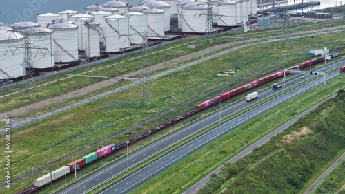 Transport in motion at Maasvlakte, Rotterdam. Dutch infrastructure. Aerial photo