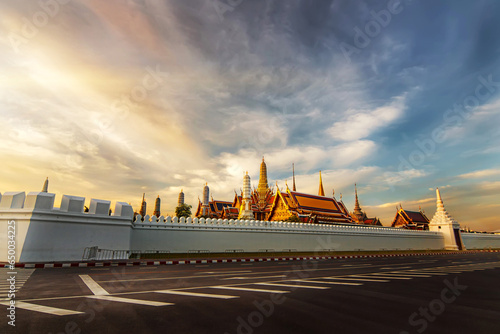 Photography Thailand Royal Grand Palace and golden temple pagoda is famous travel tourist attraction landmark in Bangkok with cloudy sunrise sky background landscape