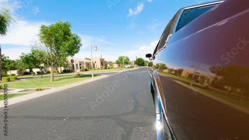 Slow motion camera attached to moving car photo