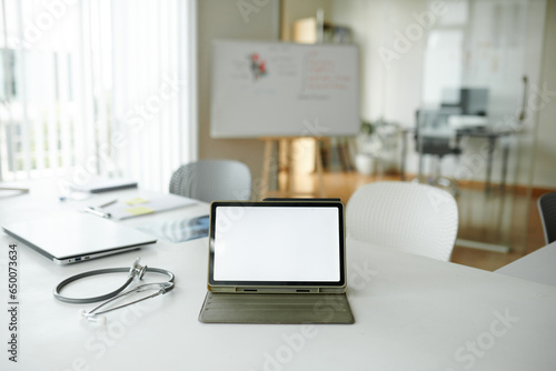 Wallpaper Mural Tablet computer with empty screen on desk of doctor in hospital Torontodigital.ca