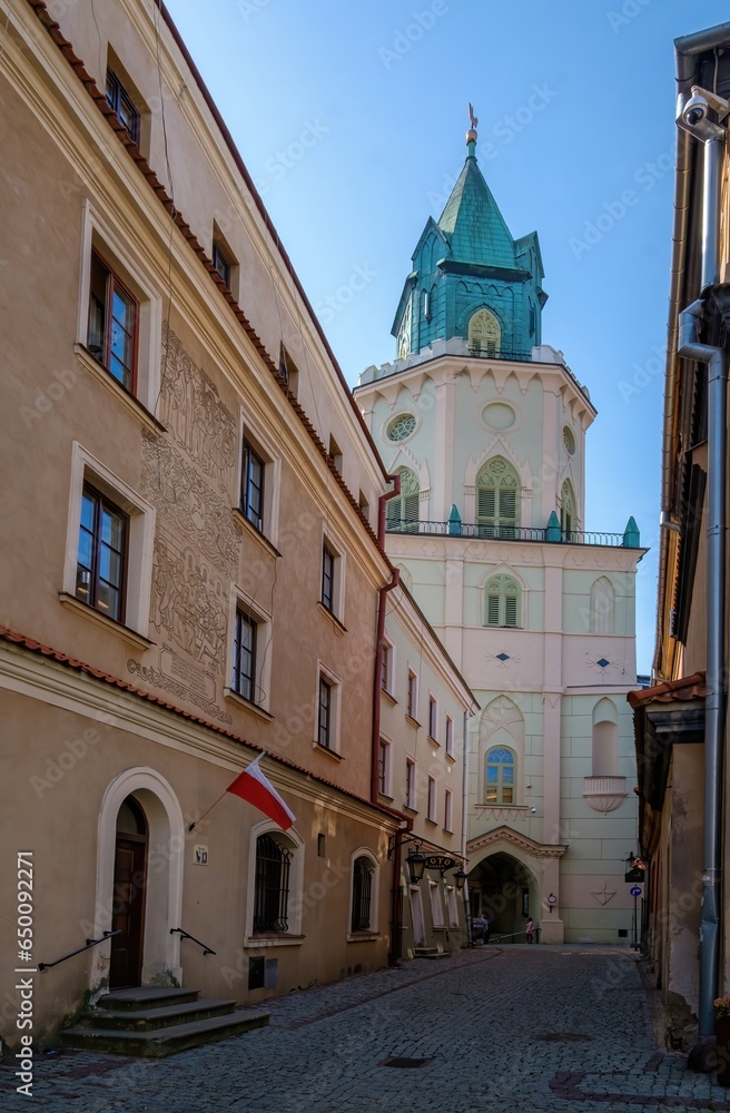 Architecture of Lublin Old Town, Lesser Poland. View of traditional colored tenements houses on central streets of Polish city of Lublin in sunny spring day