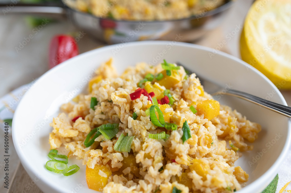 Vegetable rice with yellow zucchini, chili peppers and chives. Cooked with brown rice. Healthy gluten free side dish Vegetable rice with yellow zucchini, chili peppers and chives. Cooked with brown rice. Healthy gluten free side dish