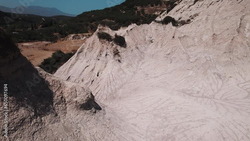 Komolithi white hills, interesting, surprising and unique conical shapes, created by erosion. Nature Preserve next to Tyflos River in Potamida, Mithimna, of the Kissamos province, Crete island, Greece photo
