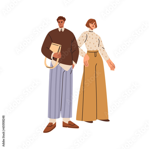 Stylish man and woman in fashion outfits. Elegant couple wearing autumn seaso...