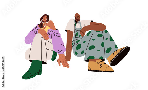 Modern fashion couple sitting. Young man and woman in outfits, trendy casual clothes. Beautiful people posing in stylish apparel. Flat graphic vector illustration isolated on white background