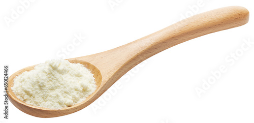 Photos Wooden spoon filled with milk powder