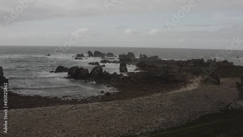 Aerial view of Oussant/Ushant in Bretagne, France. Strong wind and big waves coming ashore. photo