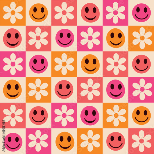 Checkered colorful happy faces with flowers seamless pattern in orange, pink and coral. For stationary, wrapping paper and fabric. 