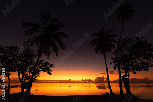 Orange sunset in French Polynesia  © Sbastien