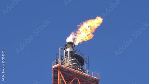Wallpaper Mural Fire Burning on Top of Gas Flare Stack Chimney in Petroleum Refinery Slow Motion Torontodigital.ca