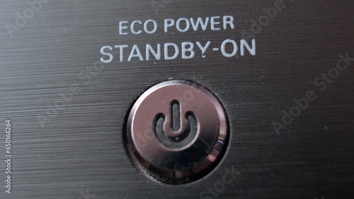 Pressing Stand By Power Button Close-Up