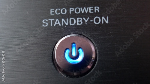 Pressing Stand By Power Button Close-Up