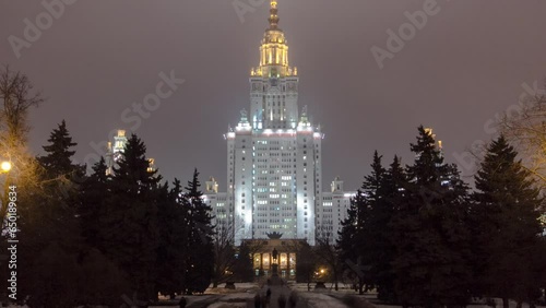 The Main Building of Moscow State University on Sparrow Hills at Winter Night Hyperlapse. Illuminated Landmark in the Heart of Moscow, Russia
