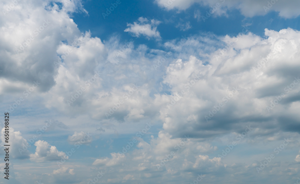 Cumulus clouds on the blue sky as a natural background. Cumulus clouds on the blue sky as a natural background.