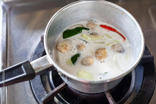 Preparing Thai chicken curry photo