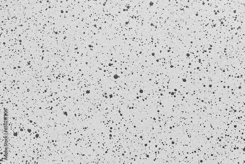 Gray quartz background or texture with black dots