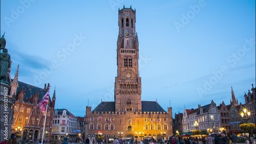 Brussels Belgium, sunset panorama city skyline at famous Grand Place town square Time lapse 4K at sunset night of the Market Square in the city of Bruges in Belgium in Flanders. Tourist city medieval photo