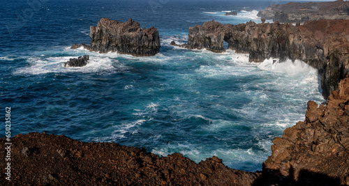 Roca basáltica en los acantilados del geositio  Hoya del Verodal en El Hierro, Islas Canarias, España photo