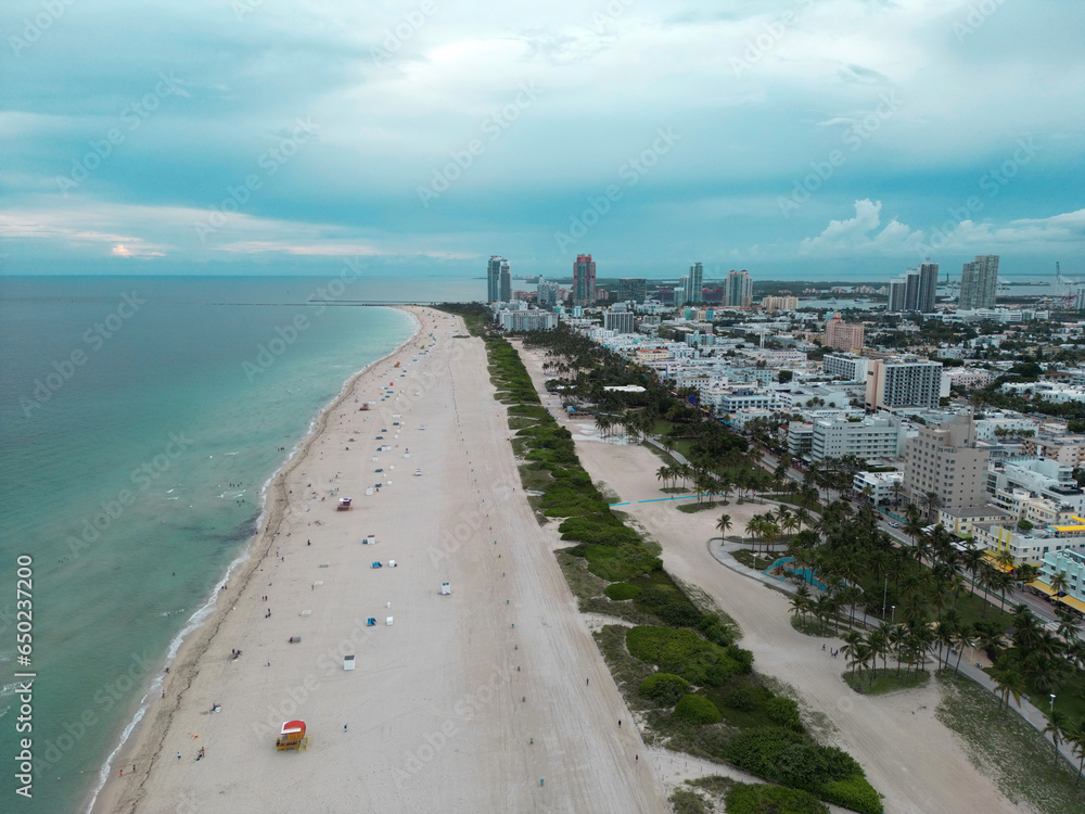Miami Beach skyline, Florida. Miami Beach city skyline view from aerial drone. Skyscrapers and harbor. Miami Beach waterfront lined with marinas. Miami beach top view from South Point Park.