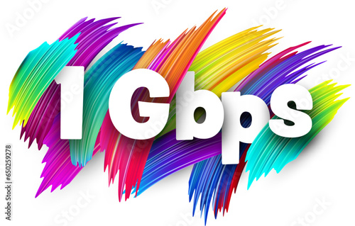 1 Gbps paper word sign with colorful spectrum paint brush strokes over white.