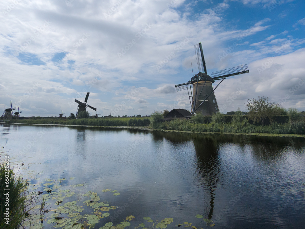 Windmills in a beautiful dutch landscape