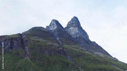 Majestic Otertinden mountain in Signaldalen valley in Norway. Two mountain peaks side by side. photo